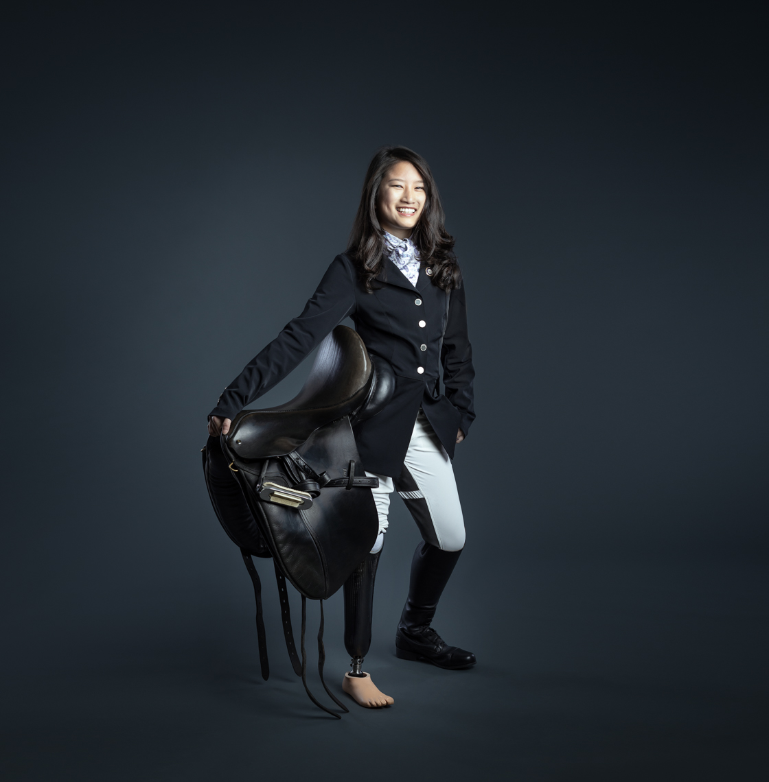 Photograph of amputee equestrian teenager for Facing Light. Image taken by Robert Houser, based in San Francisco.